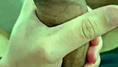 Young and straight American guy masturbates with a condom