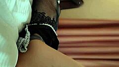 A transparent maid uniform cosplay by an Asian girl for a photoshoot