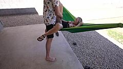 A homemade video of a hot woman having sex in a hammock outdoors