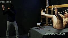 Gay BDSM whipping scene with Dr. Lomp and his helpless fat girl