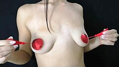 Small breasted teenager has fun with her nipples