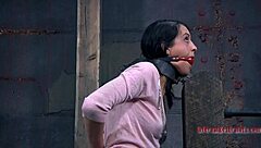 Tied babe feels intense whipping on her body