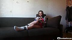 A young woman masturbates in front of a hidden camera
