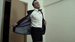 Muscular gay bodybuilder waiter masturbates