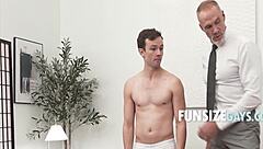 Young twink has his pants altered by a sexy older DILF tailor