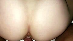 A white slut gets fucked by a big black cock in a doggy style position