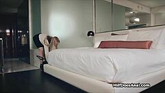 A married woman having sex with a man she is not married to in a hotel room