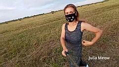 Juli Smith strips in a field and exposes herself to the public