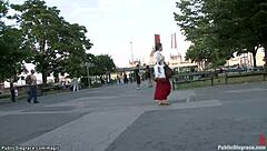 Public humiliation of a pale-skinned British woman in an outdoor setting