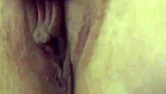 Using vibrator on her dry pussy lips for masturbation