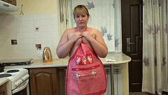 Fat BBW woman inserts cucumbers into her hairy ass for homemade fetish masturbation