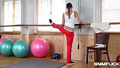 Athletic brunette nympho Taylor Sands uses jump rope handles to work out her pussy in the gym