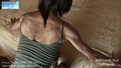 look at my muscles, cute asian girl says