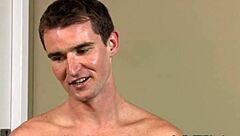 angry hunk stroking cock on sofa