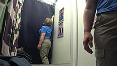 the fitting room camera caught this curvy milf's big ass in white panties as she tries on pants