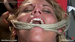 Public humiliation of a blonde with big boobs and BDSM sex
