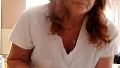 She Applies Lotion to Her Sexy Skin