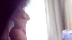 Stepmother with a big ass caught on hidden camera in the bathroom