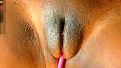 Stacy with a big pussy lips enjoying rubbing and jerking off