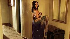An Indian film actress strips and gets intimate alone