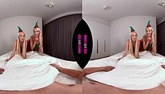 Two blonde elves in uniform give blowjobs and doggystyle in bisexual threesome for Christmas