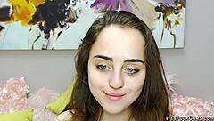Wow, watch this beautiful brunette babe with small tits play with vibrator on webcam!