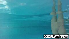 Olivia enjoys nude masturbation in the pool, showing off her big tits and ass