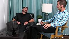 A weird gay man enjoys sucking the toes and feet of an attractive tattooed man