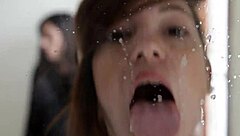 Spitting as a fetish act involving saliva exchange between partners in intimate settings.