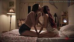 Small-titted teens indulge in hot lesbian fingering action