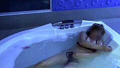 Beautiful housewife enjoys a solo session in the jacuzzi