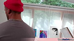 Ebony teen model tastes painter's cock