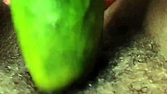 Cyndy feels intense pleasure from cucumber fuck leading to squirt