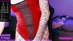 Gia Baker's amateur video with a tattooed up brunette shows her using a dildo