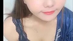 Japanese woman dances sexily with big tits at pool