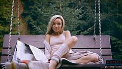 Amazing ass Russian blonde Zhenya Belaya strips outdoors in the woods.