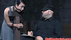 A BDSM scene with a submissive male who is flogged and teased by his dominant male partner