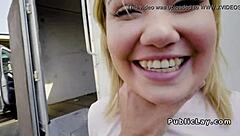 A man makes a blonde girl laugh and then have sex with her outside