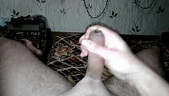 Close up of a man’s hand job with a huge load at the end