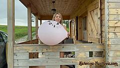 Blonde Milf Blows Huge Balloon Outdoors
