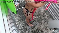 Beautiful latina stepmother in dressing gown on the beach