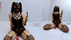 I gag on long dildo as goth slut.