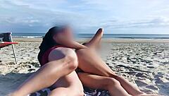 A woman of a certain age enjoys a sudden anal penetration on the beach