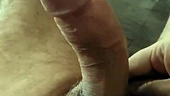 Gay porn video of a hot Latino man giving a handjob to a big cock