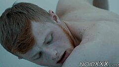cute gay ginger meets bodybuilder for an intimate encounter in a casual setting
