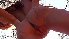 Naked Redhead Teen Plays with Water Lily Outdoors