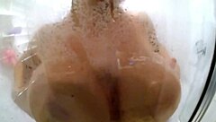 Nikki benz soaps up her big tits!