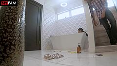 Emily's stepdad toys with her pussy.