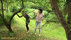 Wow! Outdoor Lesbo Watersports with Wild Fingering Action!