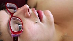 Betty fingers her hairy pussy with wild passion!